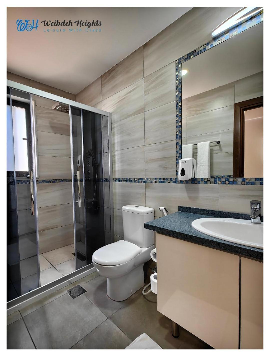 Weibdeh Heights Hotel Suites Амман Экстерьер фото